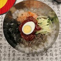 Makgoogsoo  Spicy/춘천 막국수 비밈 · With cold soup or spicy sauce,   Buckwheat cold noodles.