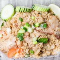 Thai Fried Rice · With egg, onion, green onion and tomatoes.