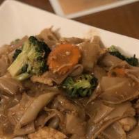 Pad See Ew · Stir-fried wide rice noodle with egg, broccoli and carrots in sweet soy sauce.