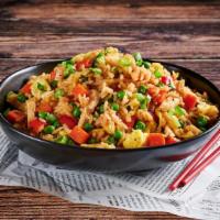 Classic Fried Rice · Hearty and flavorful fried rice featuring, rice, eggs, a vegetable medley and choice of prot...