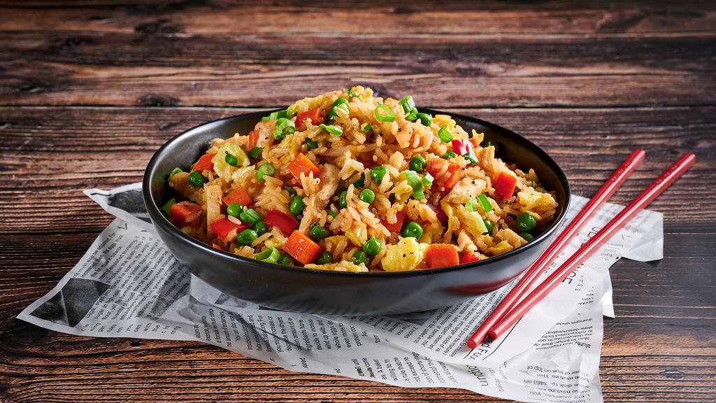 Classic Fried Rice · Hearty and flavorful fried rice featuring, rice, eggs, a vegetable medley and choice of protein