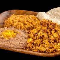 Chorizo Plate · Served with two eggs, chorizo and rice, and beans.