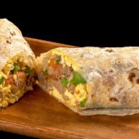 Machaca Burrito · Shredded beef, bell peppers, onions, tomatoes and eggs.