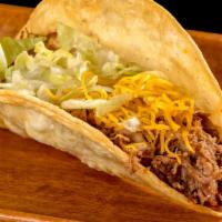 Beef Taco · Shredded beef, lettuce, cheese, hard shell