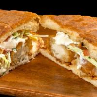 Fish Torta · Breaded fish, tartar sauce, cabbage, and pico de gallo.