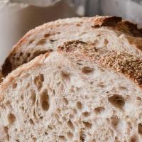 Country Sourdough Bread (1 Slice) · Buttered and toasted slice of country sourdough bread!