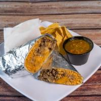 Burrito · Flour tortilla with our grilled protein, your choice of rice & beans, salsa especial, cheese...