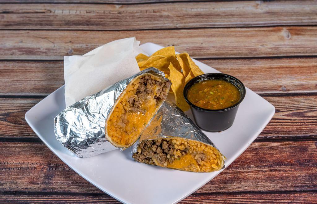 Burrito · Flour tortilla with our grilled protein, your choice of rice & beans, salsa especial, cheese & tortilla chips with salsa fresca.