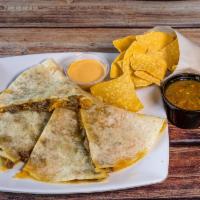 Quesadilla · Freshly made large flour tortilla with grilled protein, salsa, and tortilla chips.