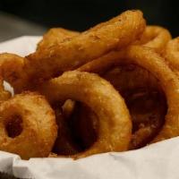 Beer Battered Onion Rings · Deliciously crunchy, beer battered, and fried onion rings.
