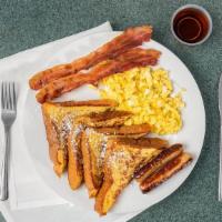 French Toast Breakfast · Two slices texas toast with two eggs and two bacon or sausage.