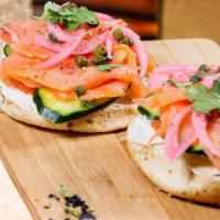 Bagel Lox · with cream cheese, smoked salmon, pickled onions, tomatoes, cucumbers and capers on everythi...