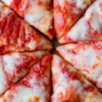 Vegan Cheese Pizza · Follow your heart vegan mozzarella with pizza sauce and crispy dough .
