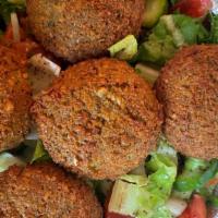 Falafel (5 Pieces) · Falafel is a deep-fried ball or patty that is made from chickpeas  or fava beans and spices....