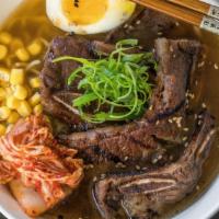 Korean Ribs Ramen · Savory pork broth, Korean style ribs, kimchi, egg noodles, bean sprouts, green onions, seawe...