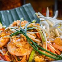 Pad Thai · Stir fried rice noodle with sweet tamarind sauce, bean sprouts, green onions, carrots. Serve...
