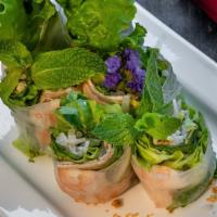 Spring Rolls · Shrimp, bean sprouts, mint, lettuce, rice noodles, wrapped in rice paper. Served with peanut...