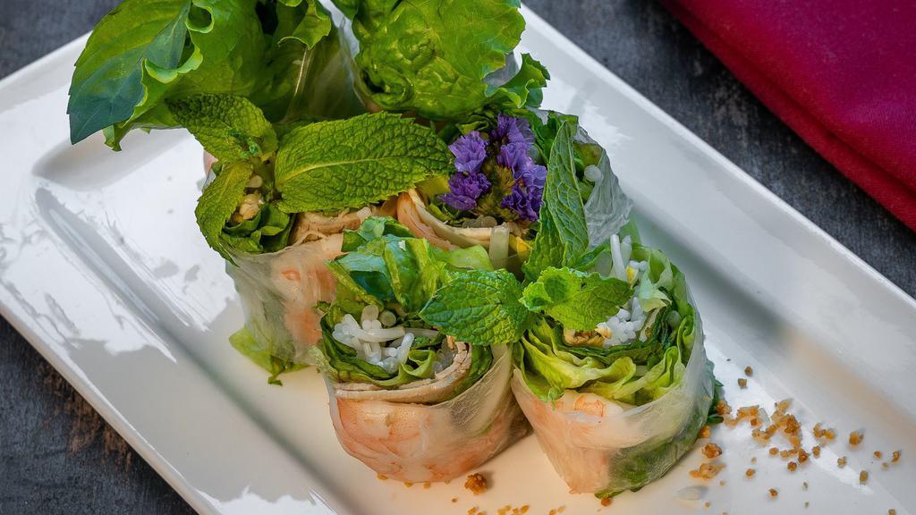 Spring Rolls · Shrimp, bean sprouts, mint, lettuce, rice noodles, wrapped in rice paper. Served with peanut sauce.