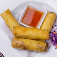 Vegeterian Egg Rolls · Mixed vegetables enveloped in spring rolls wrappers and deep-fried to a golden brown.