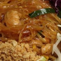Pad Thai · Sir-fried thin rice noodles with bean sprouts, eggs, green onions and ground peanuts.