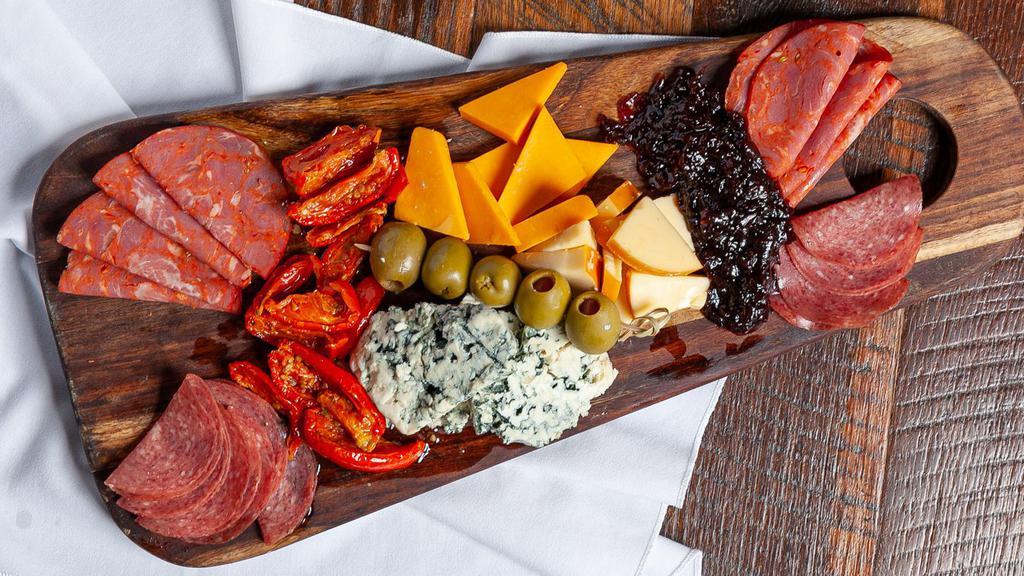 Meat & Cheese Platter · A combination of the freshest and finest, as we pick the market for your three cheese offerings. Served with dry salami, calabrese, capicola and prosciutto.