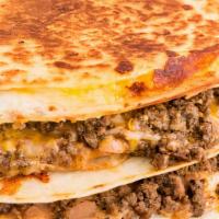Quesadilla · Grilled tortilla filled with jack and cheddar cheese and pico de gallo.