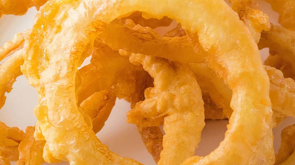 Onion Rings · Bring the crunch with these golden fried, breaded, crumb-coated onion rings, served with ranch or BBQ sauce.