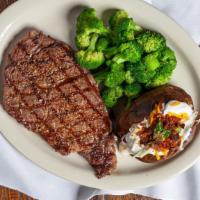 Ribeye Steak · A boneless 12 oz. cut ribeye, rich with marbling for the perfect taste. Served with your cho...