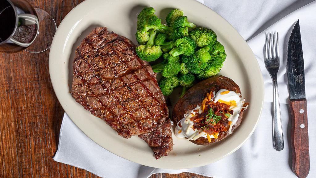 Ribeye Steak · A boneless 12 oz. cut ribeye, rich with marbling for the perfect taste. Served with your choice of two sides.