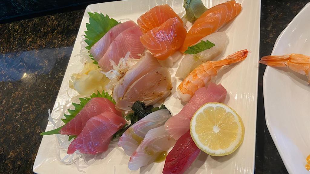 Sushi/Sashimi Dinner · Mixed Sashimi (10 pcs Bigeye tuna, Yellowtail, Salmon, Albacore, White fish), & Nigiri sushi (5 pcs).