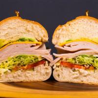Turkey Sandwich · Turkey, American Cheese, Mayo, Lettuce, Tomato, Pickles, Avocado