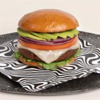 Goddess Burger · She's radical. Impossible burger, vegan cheddar, spinach, tomato, onion, avocado, mayo.