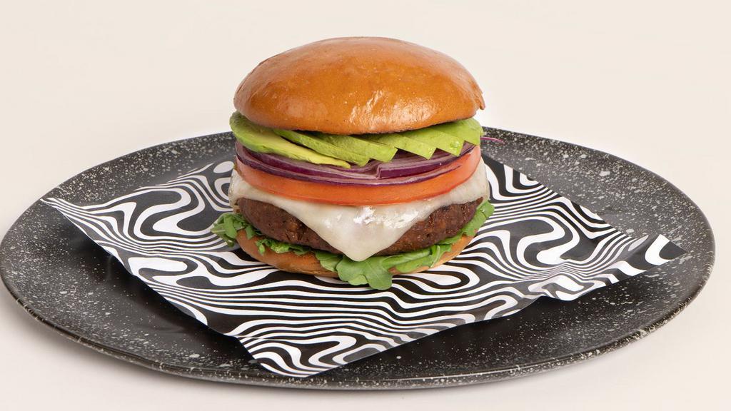 Goddess Burger · She's radical. Impossible burger, vegan cheddar, spinach, tomato, onion, avocado, mayo.