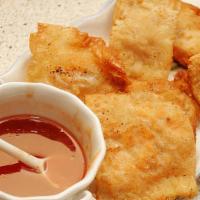 Family Meal B · Serves 3 to 5 people. Includes egg roll (3), crab Rangoon (3), fried shrimp (3), house fried...