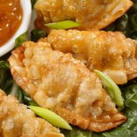 Deep-Fried Dumpling (8 Pc) · Pan-fried chicken dumplings filled with green onions.