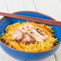 Singapore Rice Noodle · Thin rice noodle with bell pepper onion, BBQ pork, and shrimp wok stir-fried in yellow curry.