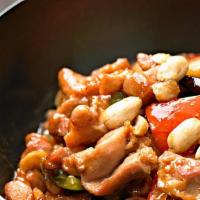 Kung Pao Chicken · Diced chicken with zucchini, celery, and carrots stir-fried in a spicy kung pao sauce topped...