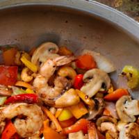 Cashew Shrimp · Shrimp with zucchini, carrots, and celery stir-fried in brown sauce topped with cashews. Sze...