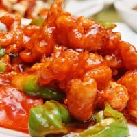 Sweet & Sour Pork · Crispy breaded pork with onion, bell pepper, carrots, and diced pineapple glazed with sweet ...