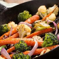 Sautéed Garden Vegetable · An assortment of vegetables, (broccoli, zucchini, carrots, Napa cabbage, baby corn, and wate...