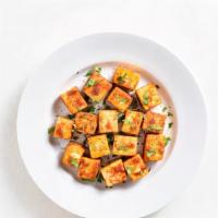 Orange Tofu · Crispy tofu wok-fried in sweet orange sauce.