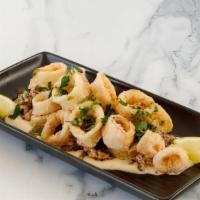 Squid With Salt & Pepper · Crisp squid wok stir-fried with salt and pepper seasoning with spice.