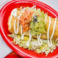 Chimichanga · Choice of meat, rice, beans, cheese, lettuce, sour cream, guacamole & tomatoes.