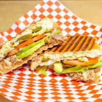 Torta Planchada (Panini Style) · Choice of meat, beans, lettuce, tomatoes, onions, jalapeños, slice avocado and sour cream.