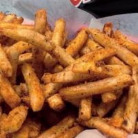 Cajun Fries  · Crispy golden fries tossed in cajun seasoning.
