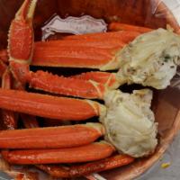 Snow Crab Legs · Two clusters of snow crab legs cooked in your favorite sauce.