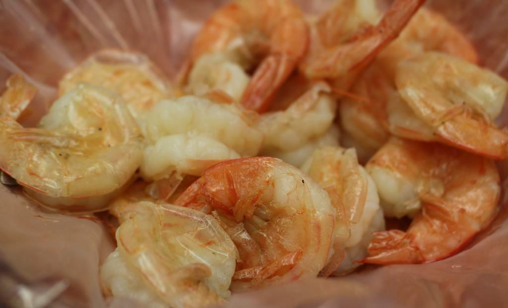 Prawns (1 Lb) · One pound of headless prawns cut and deveined.