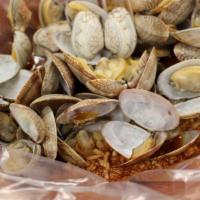 Clams · One pound of Manila clams cooked in your favorite sauce.