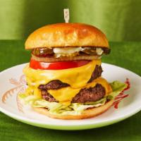 Double House Cheeseburger · Our special house cheeseburger with two patties, lettuce, tomato, onions and house sauce.