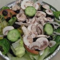 Garden Salad · Lettuce, tomato, green pepper, onion and mozzarella cheese.
